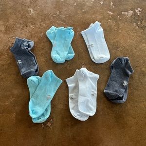 6 pair of UA socks never worn